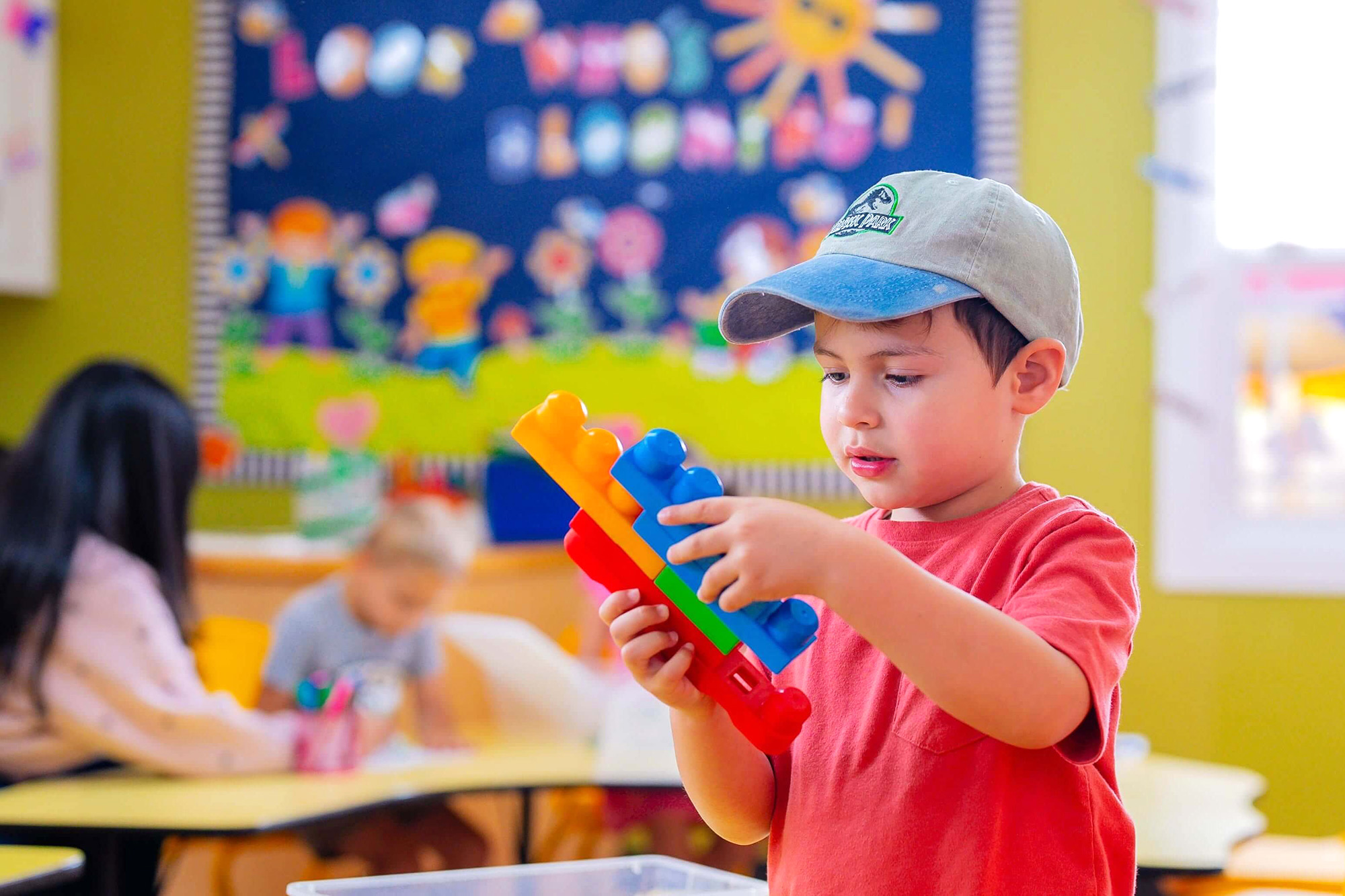 Children learning in an early childhood education classroom