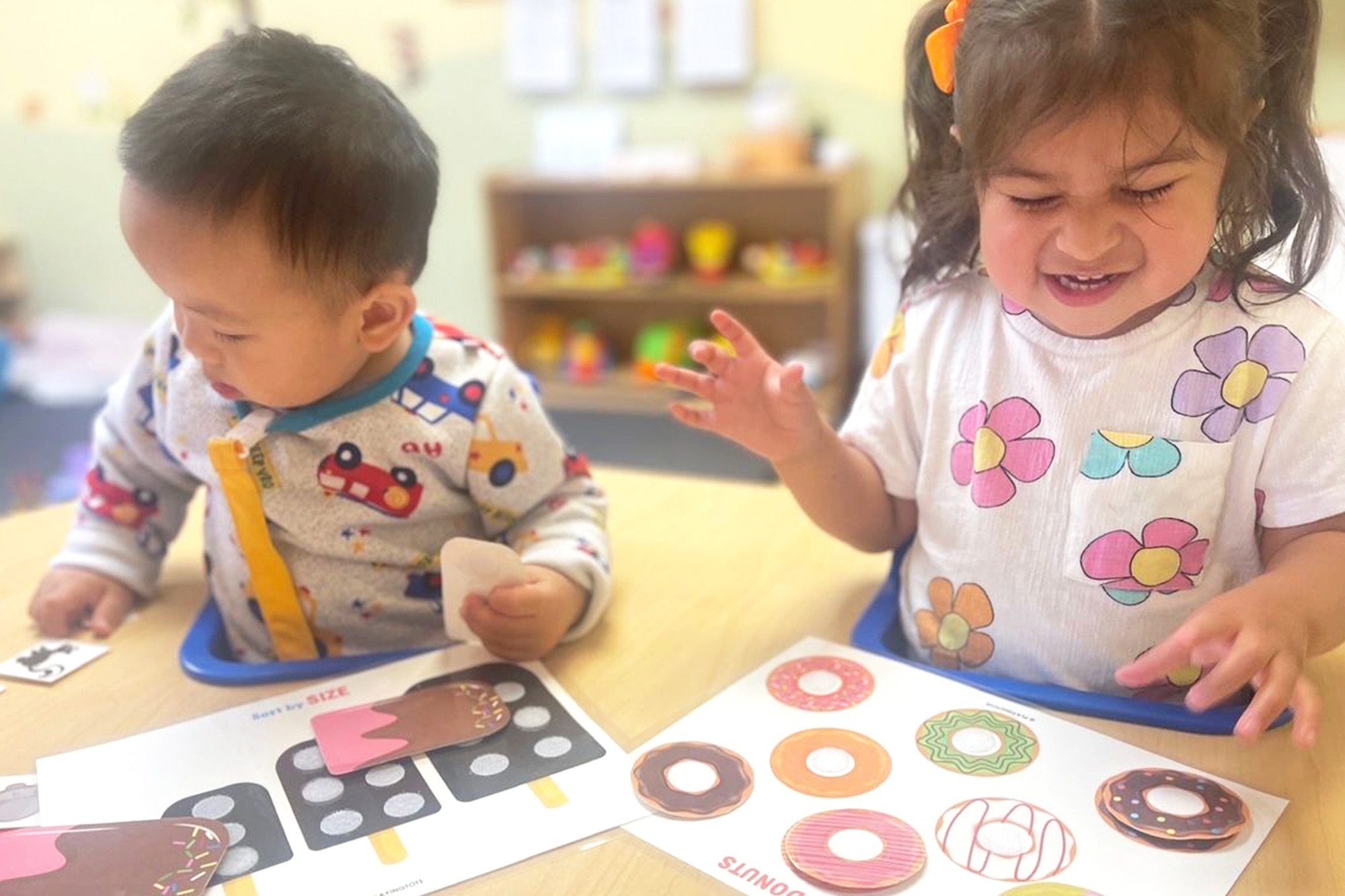 Toddler at Santa Ana preschool exploring sensory toys