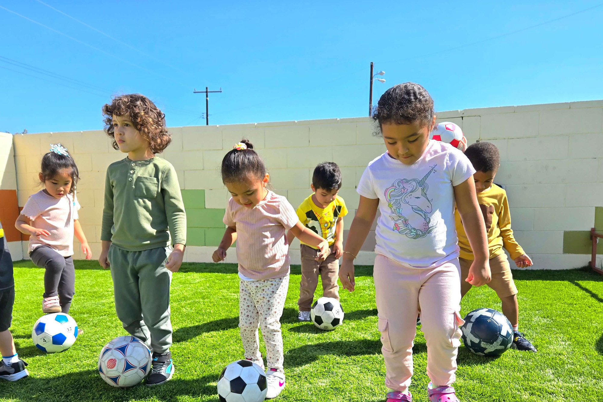 Preschoolers engaged in activities at Preschool Santa Ana.